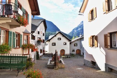 Houses in town against sky