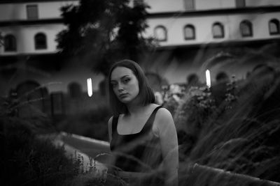 Full length of woman looking at camera