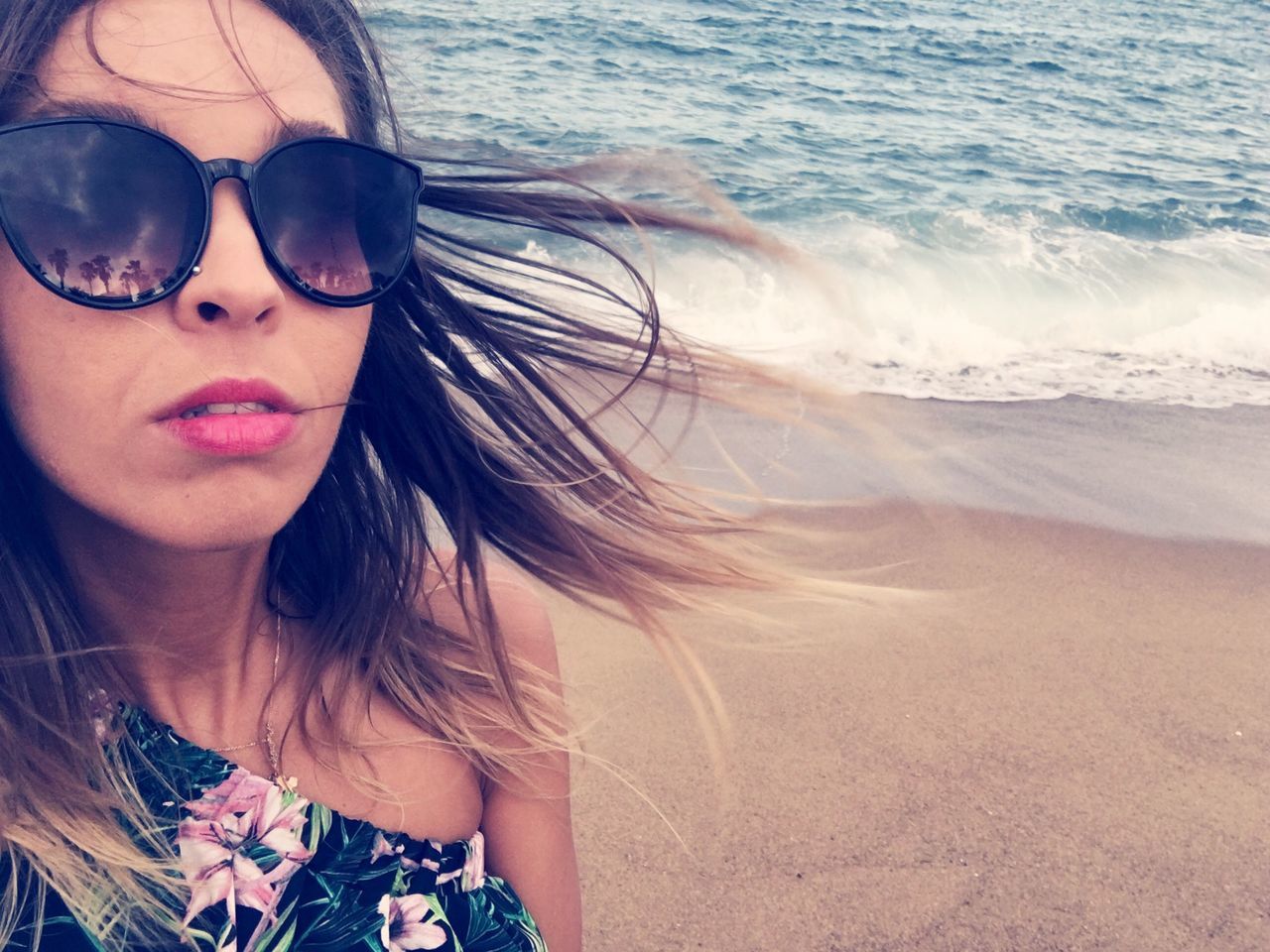 sunglasses, one person, front view, real people, water, beautiful woman, sea, outdoors, leisure activity, young adult, looking at camera, portrait, young women, day, beach, lifestyles, nature, people