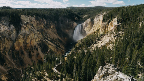 Scenic view of waterfall in yellowstone canyon