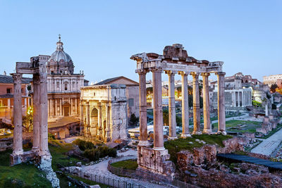 High angle view of roman forum against sky at sunset