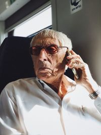 Close-up of young man sitting