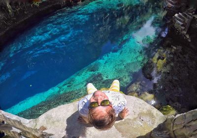 High angle view of man swimming in water
