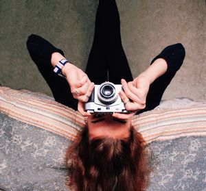 High angle view of woman photographing