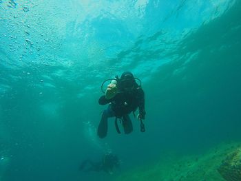 Man swimming in sea