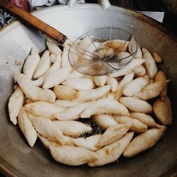 Close-up of food frying in wok