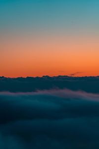 Scenic view of dramatic sky during sunset