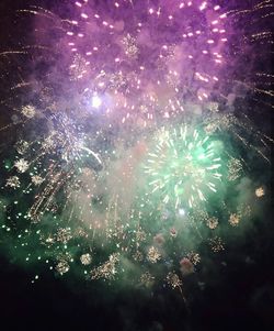 Firework display at night