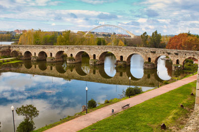 Bridge over river against sky