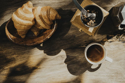 High angle view of coffee cup on table