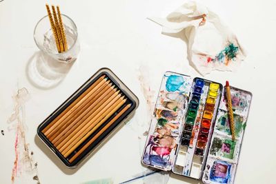 High angle view of paintbrushes on table