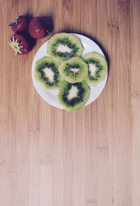 Directly above shot of food on wooden table