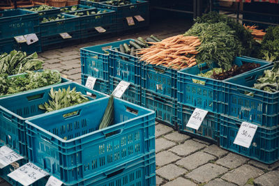 Vegetables in crate for sale at market stall