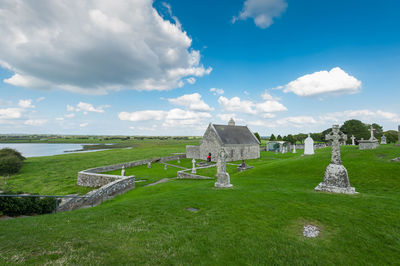 Panoramic view of cemetery against sky