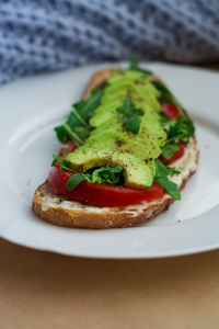 High angle view of breakfast served in plate on table