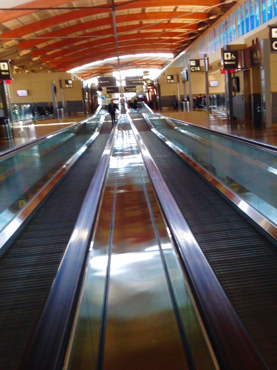 transportation, illuminated, railroad track, public transportation, railroad station platform, rail transportation, railroad station, indoors, speed, travel, motion, blurred motion, mode of transport, the way forward, built structure, diminishing perspective, architecture, subway station, train - vehicle, public transport