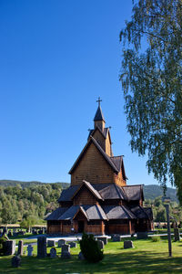 View of temple against clear blue sky