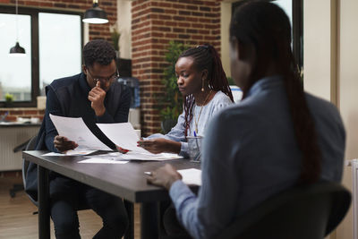 Business colleagues working at office