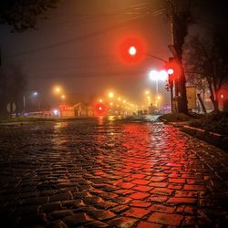 Illuminated street at night