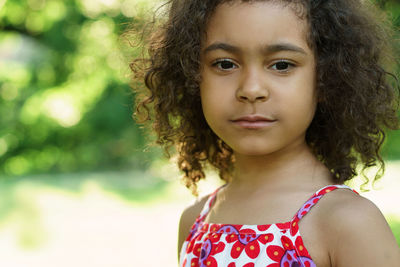 Portrait of young woman looking away