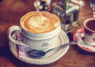 Close-up of coffee cup on table