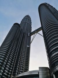 Low angle view of modern buildings against sky