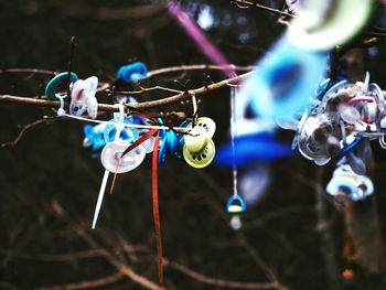 Close-up of clothespins hanging on clothesline