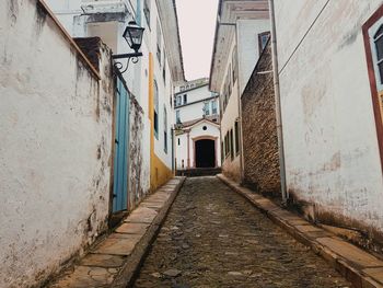 Narrow alley along buildings