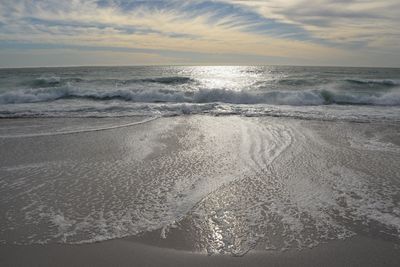 Scenic view of sea against dramatic sky