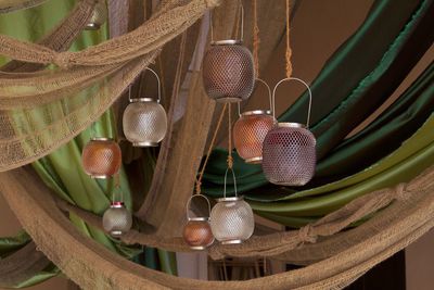 Close-up of lanterns hanging at market stall