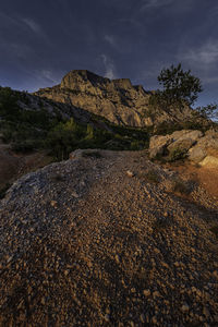 Scenic view of rocky mountains against sky