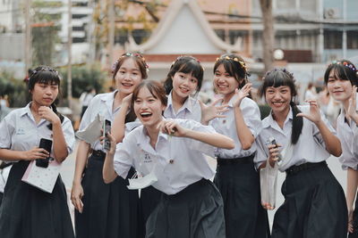 Group of people standing outdoors