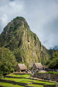 Scenic view of mountain against cloudy sky