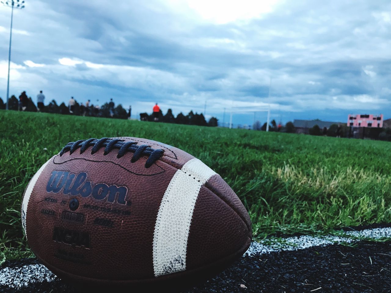cloud - sky, grass, sky, sport, field, day, no people, outdoors, nature, close-up, american football - sport