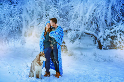 Full length of woman on snow field during winter