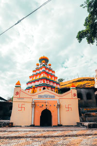 Low angle view of temple building against sky