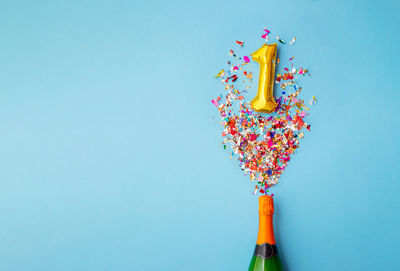 Close-up of christmas decoration against blue background