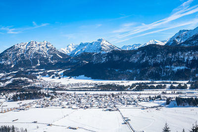 Snow covered mountains against sky