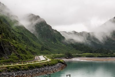 Scenic view of river and mountains