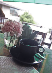 Close-up of coffee cup on table