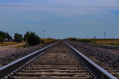 Railroad tracks against sky