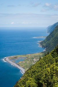 High angle view of bay against sky