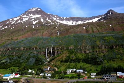 Scenic view of snowcapped mountains against sky