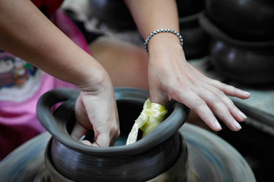Midsection of woman working