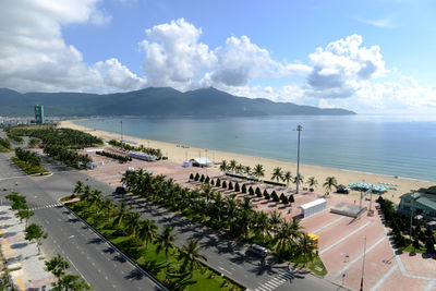 High angle view of road by sea against sky