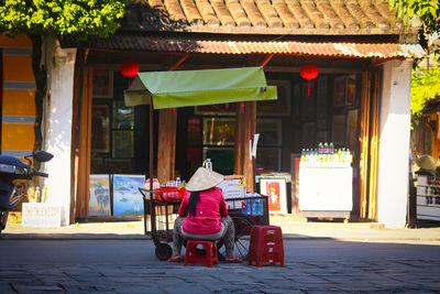 Man with umbrella on street