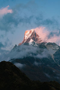 Scenic view of snowcapped mountain against sky