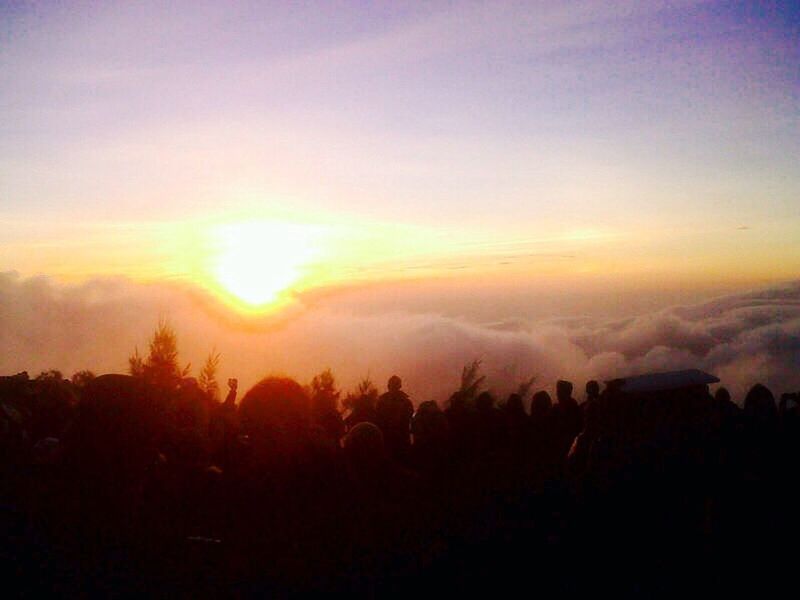 sunset, scenics, silhouette, tranquil scene, beauty in nature, landscape, sky, tranquility, nature, cloud - sky, orange color, idyllic, tree, field, weather, sun, outdoors, non-urban scene, dramatic sky, cloud