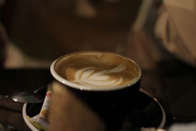 Close-up of cappuccino on table