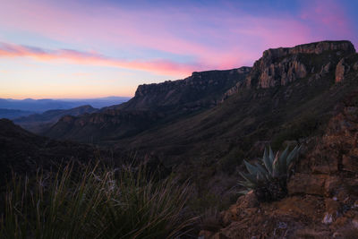 Scenic view of mountains against sky during sunset